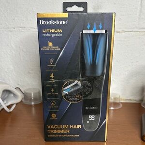 Brookstone Black and Blue Vacuum Hair Trimmer